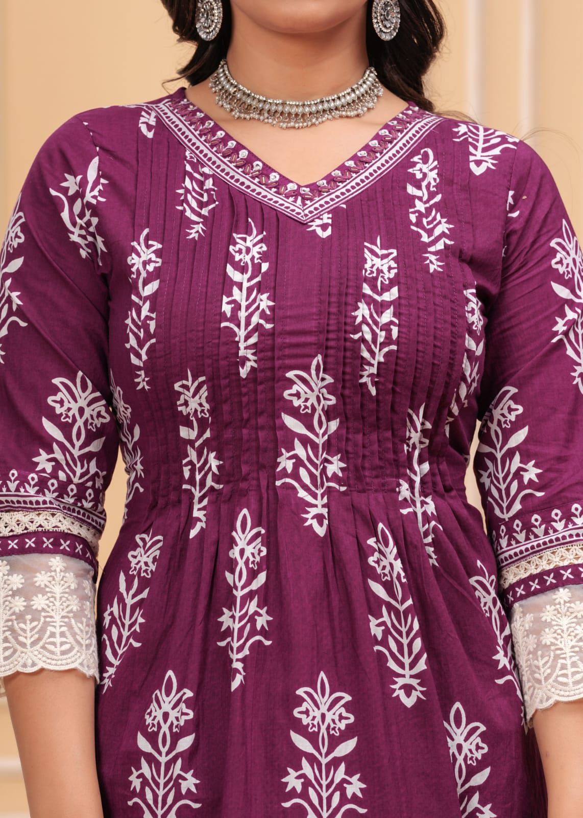 Featuring a chic pleated top with V- neck design and lace detailing, (DKGH87)